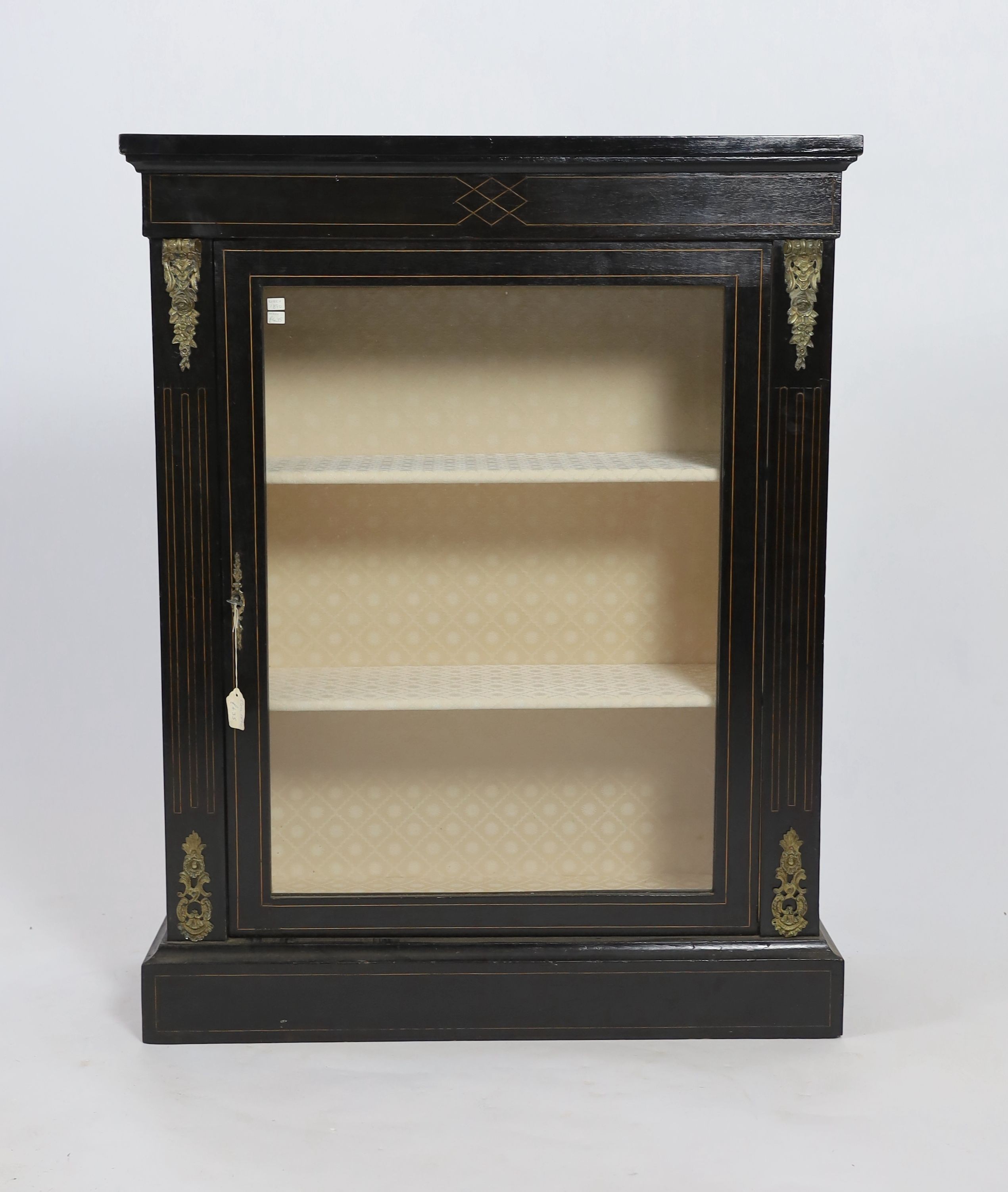 A Victorian gilt metal mounted ebonised pier cabinet, width 81cm depth 30cm height 104cm